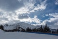 Skiing below the clouds Royalty Free Stock Photo