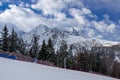 Skiing below the clouds Royalty Free Stock Photo