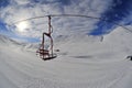 Skiing cable car over snowy slopes in the mountains Royalty Free Stock Photo