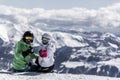 Skiing family enjoying winter vacation Royalty Free Stock Photo