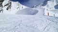 Skiing on mogul slope in alpine resort Les Arcs