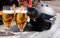 Skiing resort. Glasses of beer and a ski helmet. Royalty Free Stock Photo