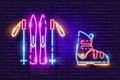 Skiing set neon icon. Skis, ski poles and boots glowing sign. Vector illustration for design. Sports concept Royalty Free Stock Photo