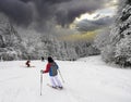 Skiing, skier, winter sport - woman skiing downhill Royalty Free Stock Photo