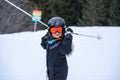 Skiing in the snow. One Asian child skier on the ski slope. Vacation in Switzerland Royalty Free Stock Photo