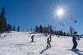 Skiing and snowboarding in the mountain area of Krasnaya Polyana ski resort, Sochi, Russia Royalty Free Stock Photo