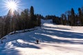 Skiing and snowboarding in the mountain area of Krasnaya Polyana ski resort, Sochi, Russia Royalty Free Stock Photo