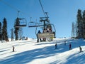 Skiing and snowboarding in the mountain area of Krasnaya Polyana ski resort, Sochi, Russia Royalty Free Stock Photo