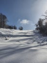 Skiing turns traces on fresh snow. Winter landscape Royalty Free Stock Photo