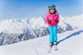 Young skier in winter resort Royalty Free Stock Photo