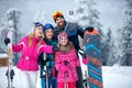 Skiing, winter fun - Mother taking selfie with her family on snow in mountains Royalty Free Stock Photo