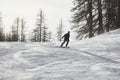 Skiing in the winter snowy slopes Royalty Free Stock Photo