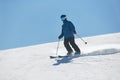 Skiing in the winter snowy slopes Royalty Free Stock Photo