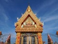 Skilfully crafted Thai temple soars into blue sky