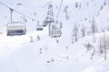 Skilifts towards the ski slopes in the Alps