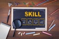 Skill Business concept. On a wooden table chalk board Royalty Free Stock Photo