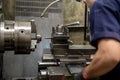 The skill operator working with lathe machine . Royalty Free Stock Photo