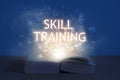 Light coming from open book with word skill training. Education concept