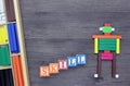 SKILL word written on wood block and Cuisenaire Rods on the table.