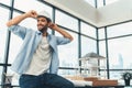 Skilled architect engineer wear safety helmet while sitting on table. Tracery. Royalty Free Stock Photo