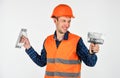 Skilled architect repair and fix. engineer worker career. tools for repair. young man in hard hat. man builder use Royalty Free Stock Photo