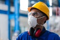 Skilled Asian worker with protective mask