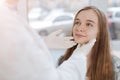 Skilled dermatologist examining patient skin in the clinic Royalty Free Stock Photo