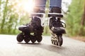 Skilled experienced inline skater making trick, spending free time with pleasure, trying new exercise, having training, Royalty Free Stock Photo