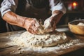 Skilled hands of a baker craft the foundation for a delicious meal