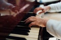 Skilled hands the old masters of piano closeup