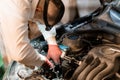 Skilled Mechanic Performing Engine Repairs in Workshop Royalty Free Stock Photo