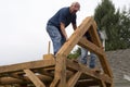 Skilled men building a barn