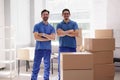 Skilled Mover Packing Boxes In Front Royalty Free Stock Photo