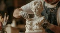 Sculptor Crafting a Detailed Marble Statue in Artisan Studio Environment