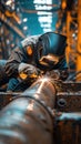 Skilled Welder Welding Industrial Steel Pipe in Factory