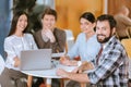 Skillful four colleagues examining market