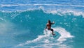 Skim Boarder riding a shore break wave at Aliso Beach in Laguna Beach, California. Royalty Free Stock Photo
