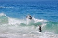 Skimboarder being photographed at Aliso Beach, Laguna Beach, CA