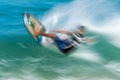 Skimboarder in the famous sununga beach