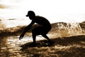 Skimboarder in water drops Royalty Free Stock Photo