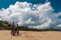 Skimboarders waiting for waves in San Pancho Mexico