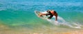 Skimboarding at Big Beach