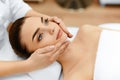 Skin, Body Care. Woman Getting Beauty Spa Face Massage. Treatment. Royalty Free Stock Photo