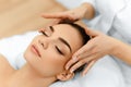 Skin, Body Care. Woman Getting Beauty Spa Face Massage. Treatment. Royalty Free Stock Photo