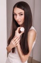 Skin Care. Beautiful healthy young woman with long hair, caring Royalty Free Stock Photo