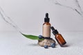 Blueberry ingredients, bottle on stone stand, Organic cosmetics