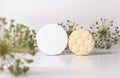 Skin care, body care products soap and solid shampoo and packaging with copy space on a light background with plant elements wit Royalty Free Stock Photo