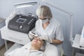 Skin Care. Close-up Of Beautiful Woman Receiving Ultrasound Cavitation Facial Peeling. Ultrasonic Skin Cleansing Royalty Free Stock Photo