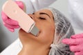 Skin Care. Close-up Of Beautiful Woman Receiving Ultrasound Cavitation Facial Peeling. Ultrasonic Skin Cleansing Royalty Free Stock Photo