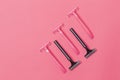 Skin Care Ideas. Flatlay Upper View Image of Five Colorful Pink and Black Disposable Razors Shavers Placed Reversed Over Trendy